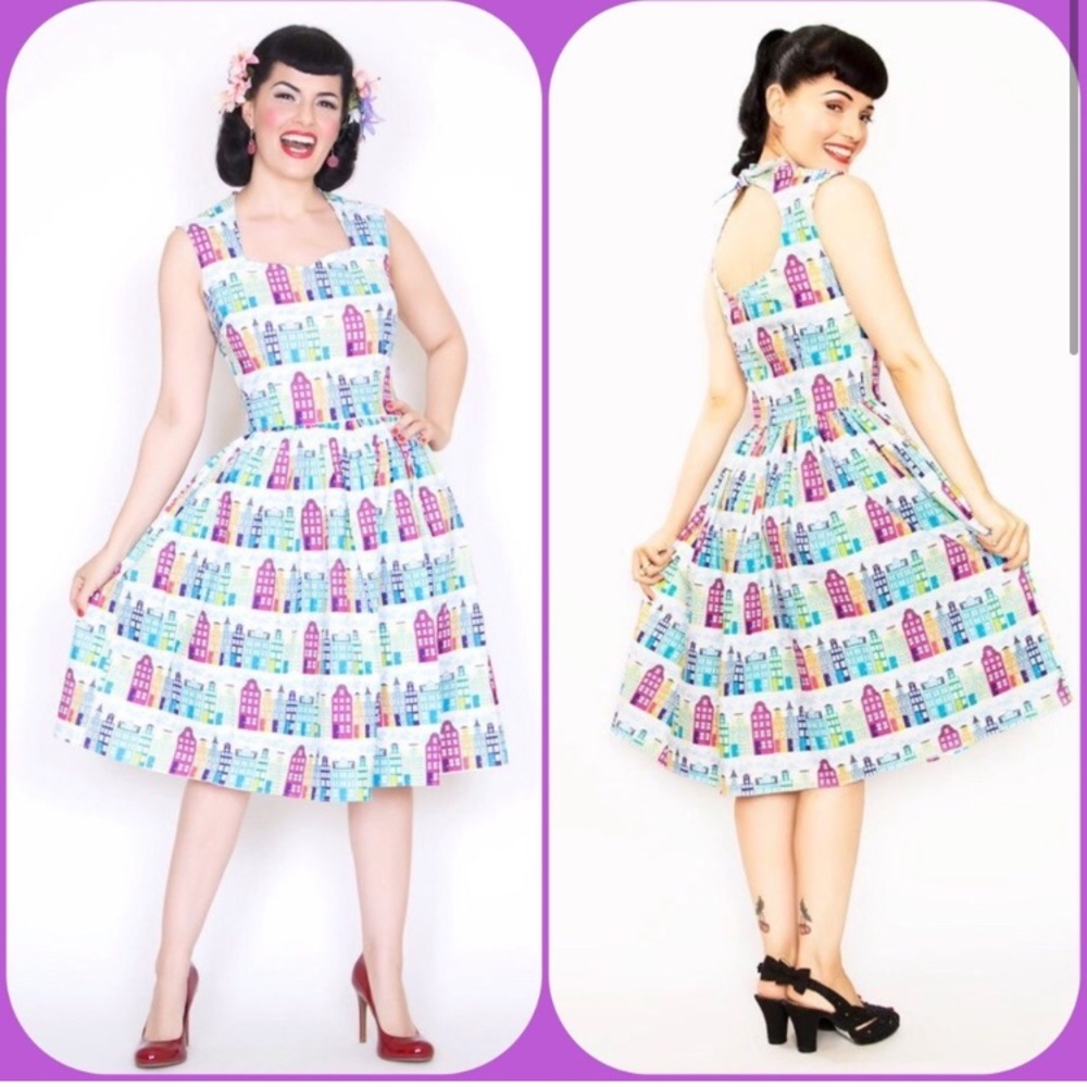 Vintage-Inspired White Sleeveless Fit & Flare Dress with Colorful City Print